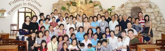 Catecúmenos chinos adultos en la parroquia de Novena, en Singapur, donde Andrew es catequista