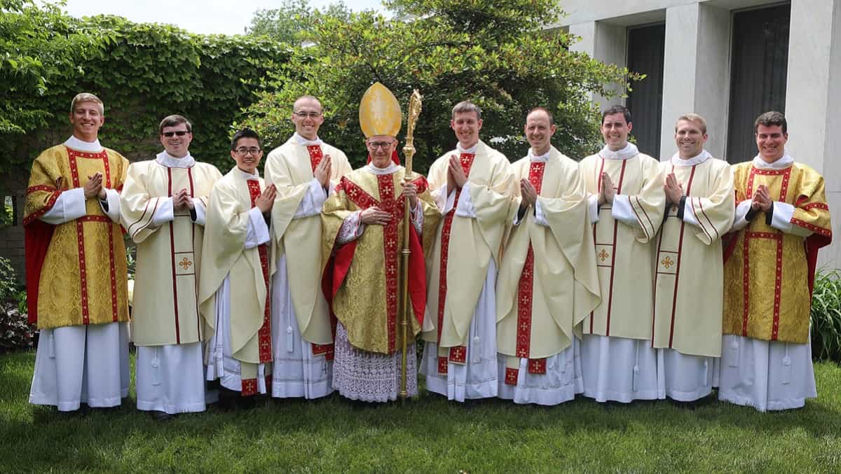 James Conley, con sacerdotes recién ordenados