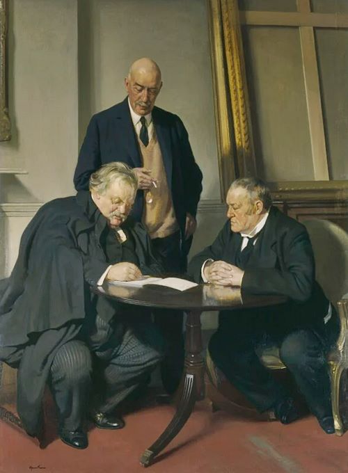'The conversation piece [El tema de conversación]' (1932), cuadro de James Gunn en el National Portrait Gallery: representa a Chesterton y Belloc, sentados, y a Baring, de pie.