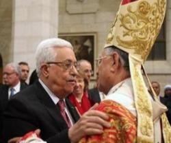 El Patriarca Latino, Fouad Twal, y el presidente palestino, Mahmoud Abbas, en Belén