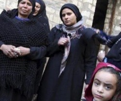 Mujeres cristianas del pueblo egipcio de El Our, parientes y vecinas de los mártires decapitados en Libia