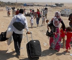 Refugiados sirios llegando a Irak... que tiene sus propios desplazados