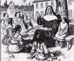 La M. María instruye a las niñas indígenas.