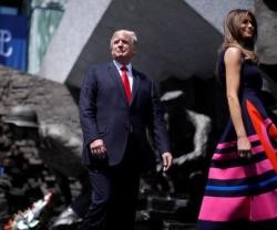 Trump, Melania y detrás el monumento polaco que recuerda la II Guerra Mundial
