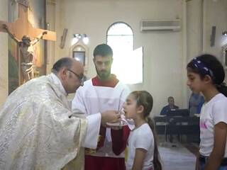 El último verano de los católicos de Gaza